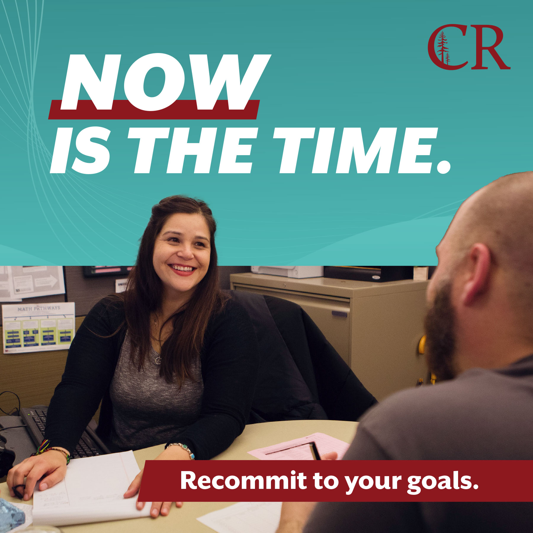 student across desk from counselor